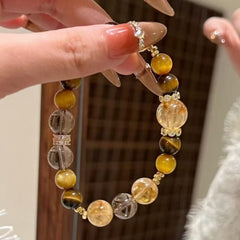 Let you have good luck and more wealth. Natural yellow tower crystal, golden tiger eye yellow crystal, original design bracelet
