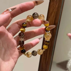 Let you have good luck and more wealth. Natural yellow tower crystal, golden tiger eye yellow crystal, original design bracelet